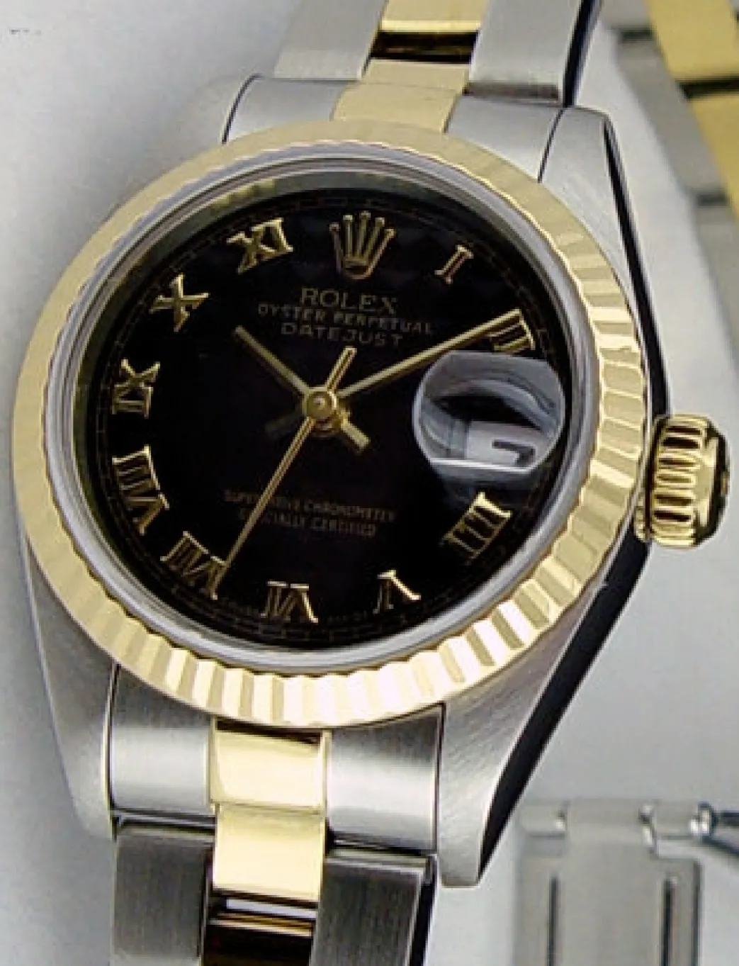 rolex_ladies_kt_gold__sta_0-1.webp Ladies Watches | Dress Watches | Sant Blanc ROLEX Ladies 18kt Gold & Stainless Steel DateJust Black Pyramid Roman Dial Model 79173