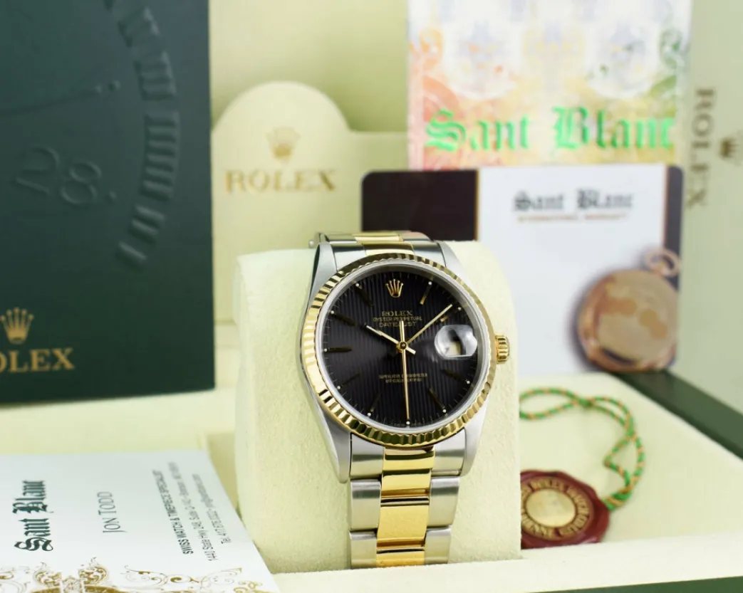 rolex_mm_kt_gold__stainle_1-17.webp Men's Watches | Dress Watches | Sant Blanc ROLEX 36mm 18kt Gold & Stainless DateJust Black Tapestry Dial Oyster Band Model 16233